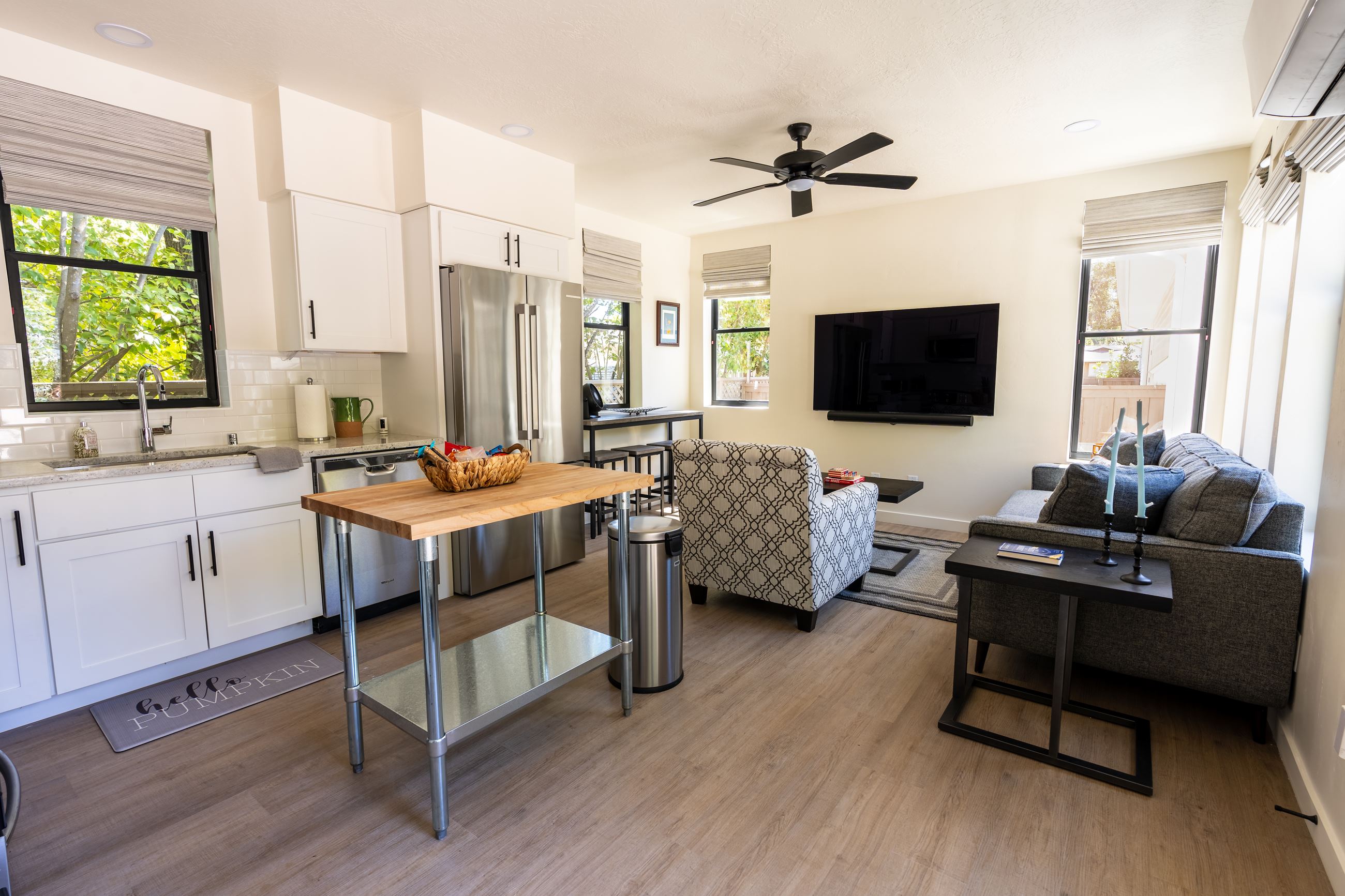 The interior of a home showing a kitchen and living room 