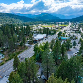 Town of Truckee from bird's eye view with cars and buildings and trees. 