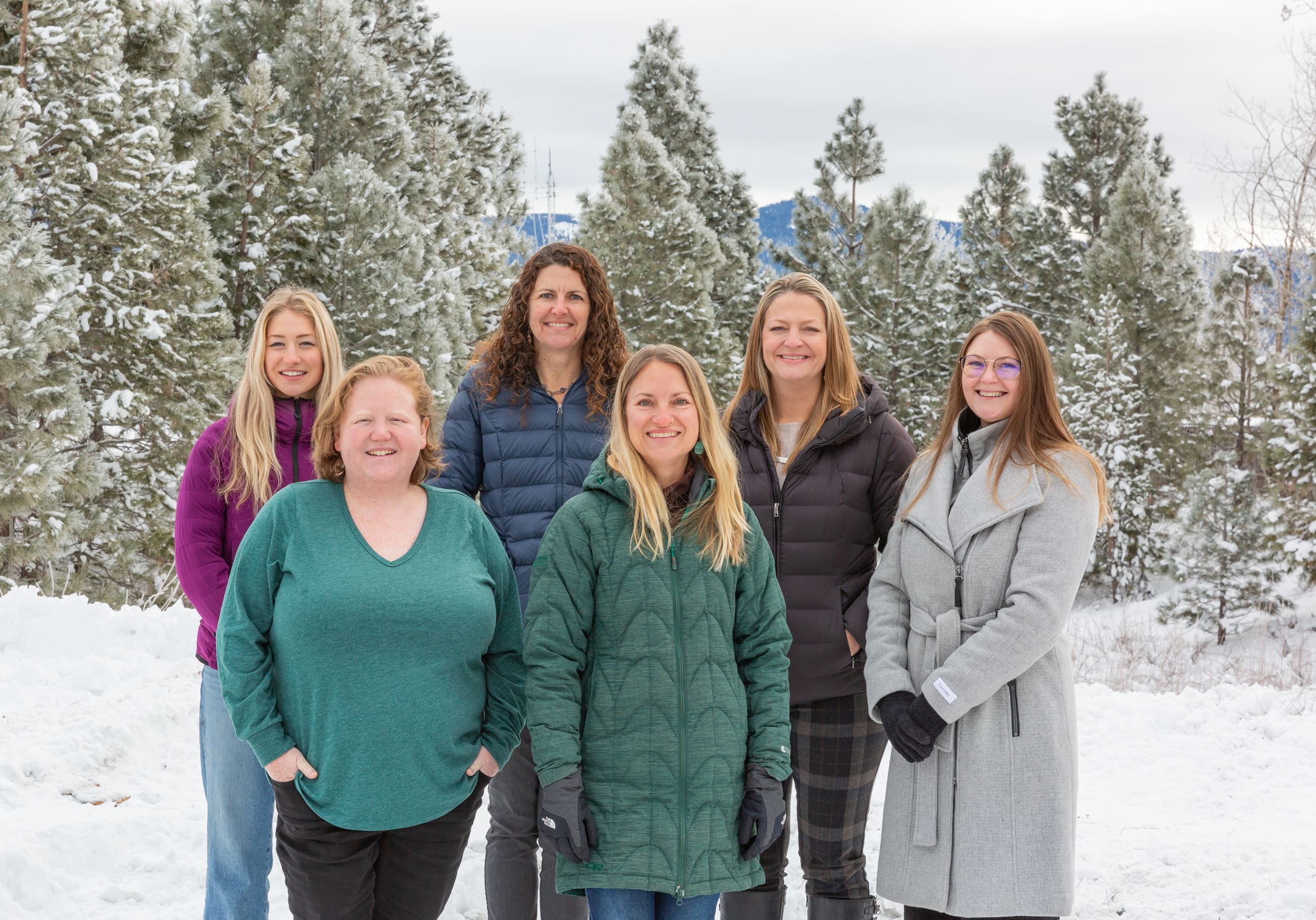 A photo of Town Clerk staff all standing together smiling. 