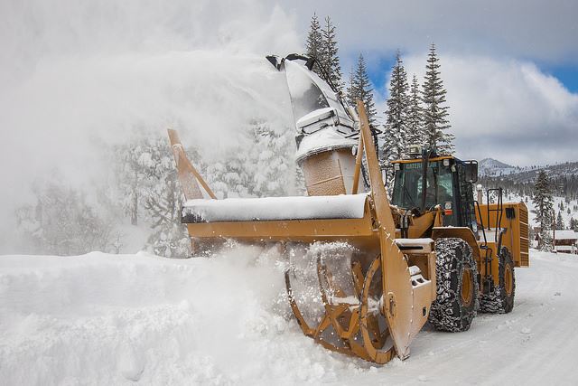 Vehicle Removing a Snow Berm